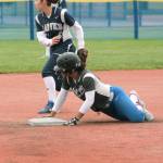 <em>Olympic shortstop Kiki Mitchell slides into second during a district tournament game.</em>                                Mark Krulish / Kitsap News Group