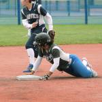 <em>Olympic shortstop Kiki Mitchell slides into second during a district tournament game.</em>                                Mark Krulish / Kitsap News Group