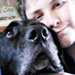 Dakota Braun, 14, is happily reunited with his dog Mowgli thanks to staff members at Kitsap Humane Society, who checked the canines pet license. (Kitsap Daily News photo)