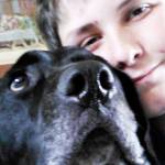 Dakota Braun, 14, is happily reunited with his dog Mowgli thanks to staff members at Kitsap Humane Society, who checked the canines pet license. (Kitsap Daily News photo)