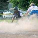 <em>Alicia Goetz slides safely into third during the state tournament. The junior second baseman is one of five North Kitsap players named to an All-League team. </em>Mark Krulish / Kitsap News Group
