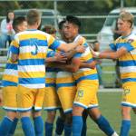 The Pumas celebrate after Ismael DeLuna (15) scored his second goal of the game. DeLuna is a former North Kitsap standout. (Mark Krulish/Kitsap News Group)