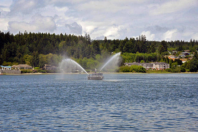 The Poulsbo Fire Department offers a two-nozzle display from their new emergency response vessel, Viking Shields. Courtesy Steve Erickson.