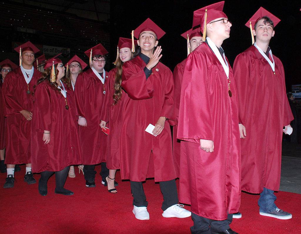 South Kitsap graduates acknowledge familiar faces in the Tacoma Dome audience. (Bob Smith | Kitsap Daily News photo)
