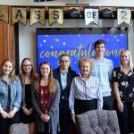 From left to right: Cassidy Cloward; Erin Pearson; Jacey Cline Mann; Breeanna Davis; Ryley Tellinghuisen; Carly Cloward; Helen Langer Smith, Kitsap Bank vice chairwoman; Wesley George; Kristen Gorden; Eliza Patenio and Anna Dorris. Not shown: Hunter Collins and Zack Storvick. (Kitsap Bank photo)
