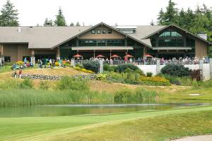 <em>Fans wait near the 18th hole during the inaugural Clearwater Legends Cup held at White Horse Golf Club. </em>                                Mark Krulish / Kitsap News Group
