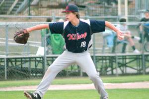 Sam Demianiw comes on in relief for Kitsap AA against River Ridge. Kitsap lost the game 11-1. (Mark Krulish/Kitsap News Group)