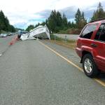The trailer was being towed by the red Jeep Grand Cherokee. (Photo courtesy of Washington State Patrol Trooper Chelsea Hodgson)