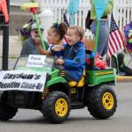Caden is the driver, aided by navigator Lily, of Cadens Demolition Clean-Up pace car. They opened the Fathoms O Fun Grand Parade down Bay Street on June 30. (Bob Smith | Kitsap Daily News)