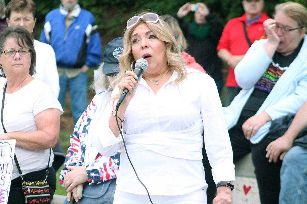 Hundreds gather in Bremerton’s Evergreen Park to protest family separations