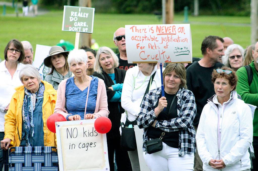 Hundreds gather in Bremerton’s Evergreen Park to protest family separations