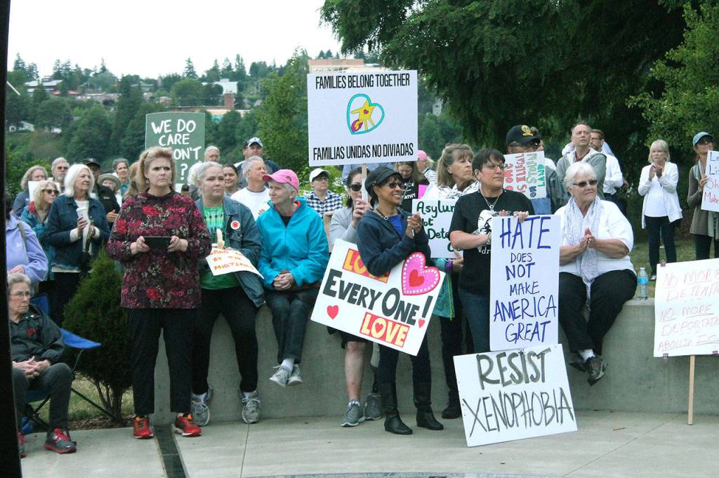 Hundreds gather in Bremerton’s Evergreen Park to protest family separations