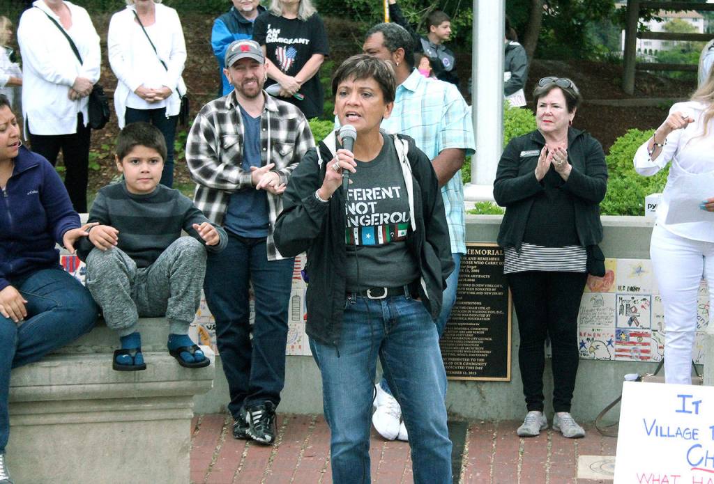 Hundreds gather in Bremerton’s Evergreen Park to protest family separations