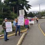 Demonstrators in Kingston took to the streets on Sunday, July 1 to denounce the forced separation of families of illegal immigrants. Nick Twietmeyer / Kitsap News Group.