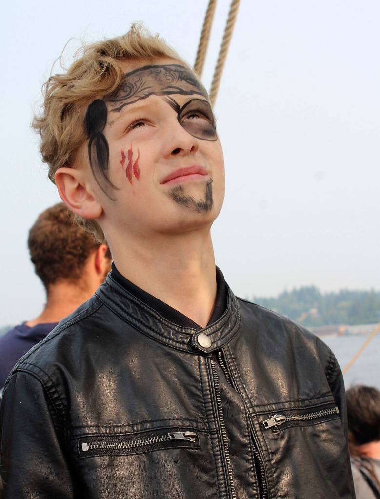 Paul Hanifan, 8, of Portland checks out the rigging on Hawaiian Chieftain. (Bob Smith | Kitsap Daily News photo)