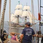 Tall ship Lady Washington sails within cannon fire of Hawaiian Chieftain on Sinclair Inlet. (Bob Smith | Kitsap Daily News photo)