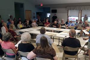 Opponents to aerial spray of herbicides retain lawyer