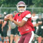 South Kitsap quarterback Hezekiah Moore looks down the field for an open receiver during a jamboree against Central Kitsap and Bremerton. (Mark Krulish/Kitsap News Group)