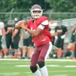 South Kitsap quarterback Hezekiah Moore looks down the field for an open receiver during a jamboree against Central Kitsap and Bremerton. (Mark Krulish/Kitsap News Group)