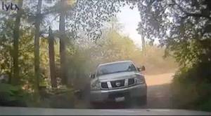 Dash cam footage from a utility vehicle appears to show the driver of the Nissan ramming the workers vehicle. Courtesy Washington State Patrol.