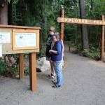 A wooden sign welcomes visitors to the new Forest Explorer Trail. (Bob Smith | Kitsap Daily News)