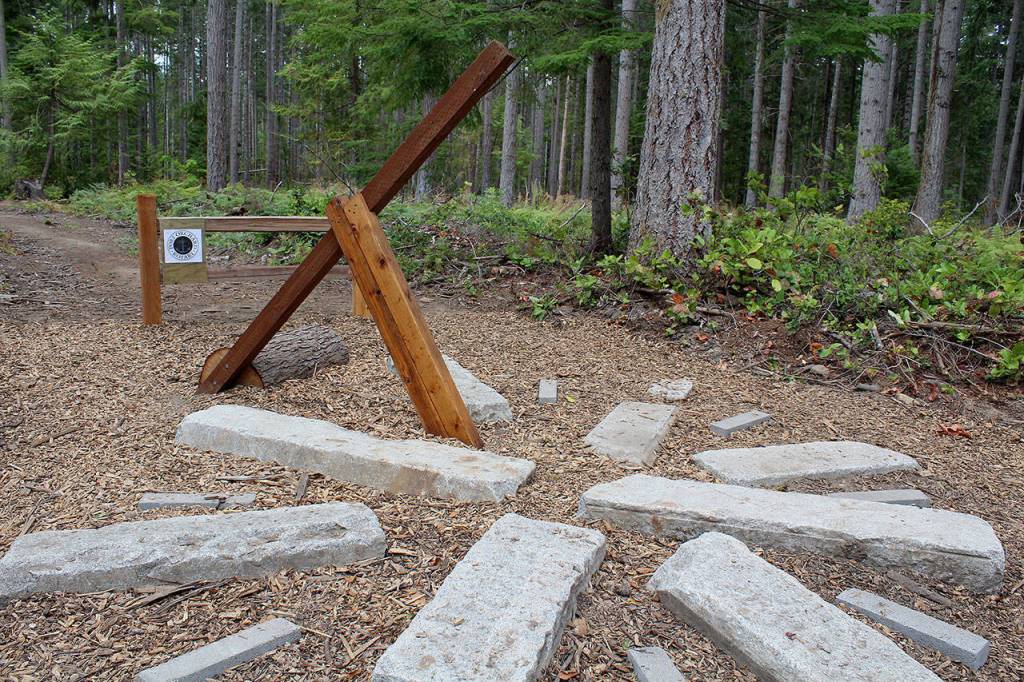 A sundial constructed out of wood beams and granite blocks is a highlight of the new nature trail. (Bob Smith | Kitsap Daily News)