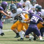 Bainbridges Alex Ledbetter tries to break away from the pile. (Mark Krulish/Kitsap News Group)