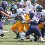 Bainbridges Alex Ledbetter tries to break away from the pile. (Mark Krulish/Kitsap News Group)