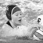 Mark Krulish | Kitsap News Group                                Jazmin Lamoureux fights for a loose ball during a water polo match against Tahoma in April.