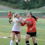 South Kitsaps Eliza Villarma and Central Kitsaps Camryn Castro battle for possession of the ball. (Mark Krulish/Kitsap News Group)