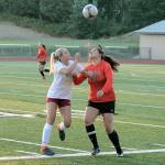 South Kitsaps Eliza Villarma and Central Kitsaps Camryn Castro battle for possession of the ball. (Mark Krulish/Kitsap News Group)