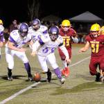 Buccaneers defenders battle with Sequim players for a loose ball. (Michael Dashiell/Sequim Gazette)