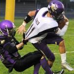 North Kitsaps John Jones gets his jersey pulled by a Sequim defender. (Michael Dashiell/Olympic News Group)