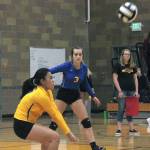 Bremertons Patricia Reyes digs out a spike while teammate Jennifer Kielley looks on. (Mark Krulish/Kitsap News Group)