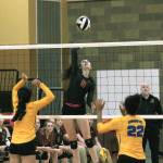 <em>Kingstons Grayce Hentzel scores a late kill for the Bucs in her teams victory over Bremerton. </em>Mark Krulish/Kitsap News Group