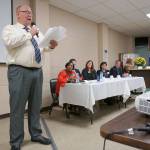Matt Murphy, executive director of the Port Orchard Chamber of Commerce, prepares to introduce candidates running for 26th Legislative District seats in the state Legislature in Olympia. (Bob Smith | Kitsap Daily News)