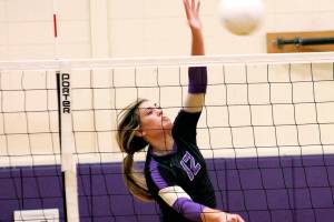 Maddie Pruden spikes a ball during North Kitsaps Oct. 10 match against Kingston. (Mark Krulish/Kitsap News Group)