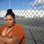 ShaCorrie Tunkara stands outside of the detention center where her husband has been detained since January. Photo by Melissa Hellmann