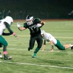 Hunter Wallis scored four touchdowns for Klahowya in a 44-20 win over Charles Wright Academy. Wallis rushed for 109 yards and three scores and returned an interception for a touchdown. (Mark Krulish/Kitsap News Group)