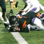 Central Kitsaps Joshua Willis crashes into the end zone against North Thurston. (Mark Krulish/Kitsap News Group)