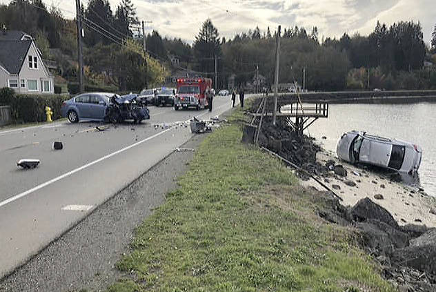 Casey Guthrie photo                                Two vehicles collided head-on Oct. 26 on Beach Road in South Kitsap. According to Kitsap County Sheriffs Office spokesman Deputy Scott Wilson, the male driver was uninjured. The female driver reported to the Independent that she had suffered broken bones and other injuries requiring surgery.
