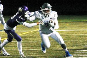 Olympics Darelle White tries to get past a North Kitsap defender. (Mark Krulish/Kitsap News Group)