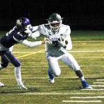 Olympics Darelle White tries to get past a North Kitsap defender. (Mark Krulish/Kitsap News Group)