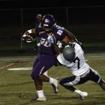 Isaiah Kahana breaks free for a 32-yard run in the first half against River Ridge. (Mark Krulish/Kitsap News Group)