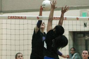 North Kitsaps Taylor Clodfelder records a kill against Fife. (Mark Krulish/Kitsap News Group)