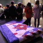 Second-grade teacher Linda Hemry presented a quilt of valor to Jeff Mitchell during the event. Mitchell served in the Marine Corps for eight years.