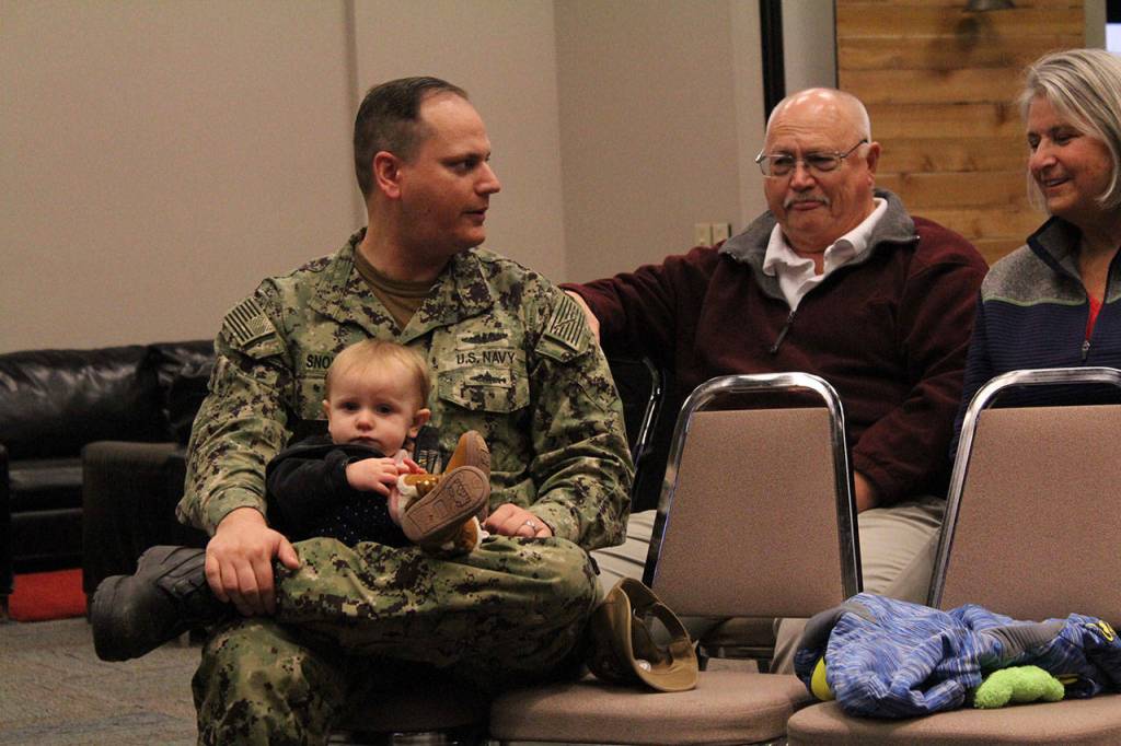Students family members were invited to the event as well. Navy Electronics Technician Jeffrey Snow was in the crowd, holding his daughter Oceana, 1.