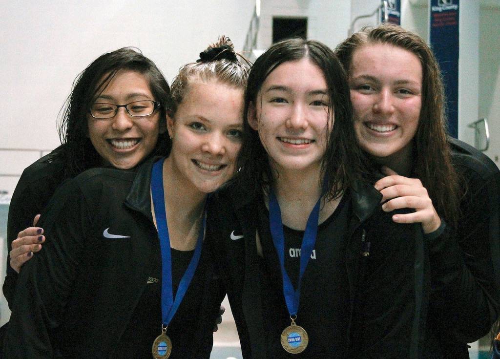 The 200-yard freestyle relay team of Izy Iral, Eleanor Beers, Layna Hart and Brianna Hoffman won a state championship in 1:40.50. (Mark Krulish/Kitsap News Group)