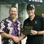 North Kitsap head coach Greg Braun was presented with the Coach of the Year award by the Washington Interscholastic Swim Coaches Association for the second year in a row. (Mark Krulish/Kitsap News Group)