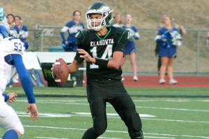 Klahowya quarterback John Hartford now holds the school records for passing yardage (1,809) and touchdowns (19). (Mark Krulish/Kitsap News Group)
